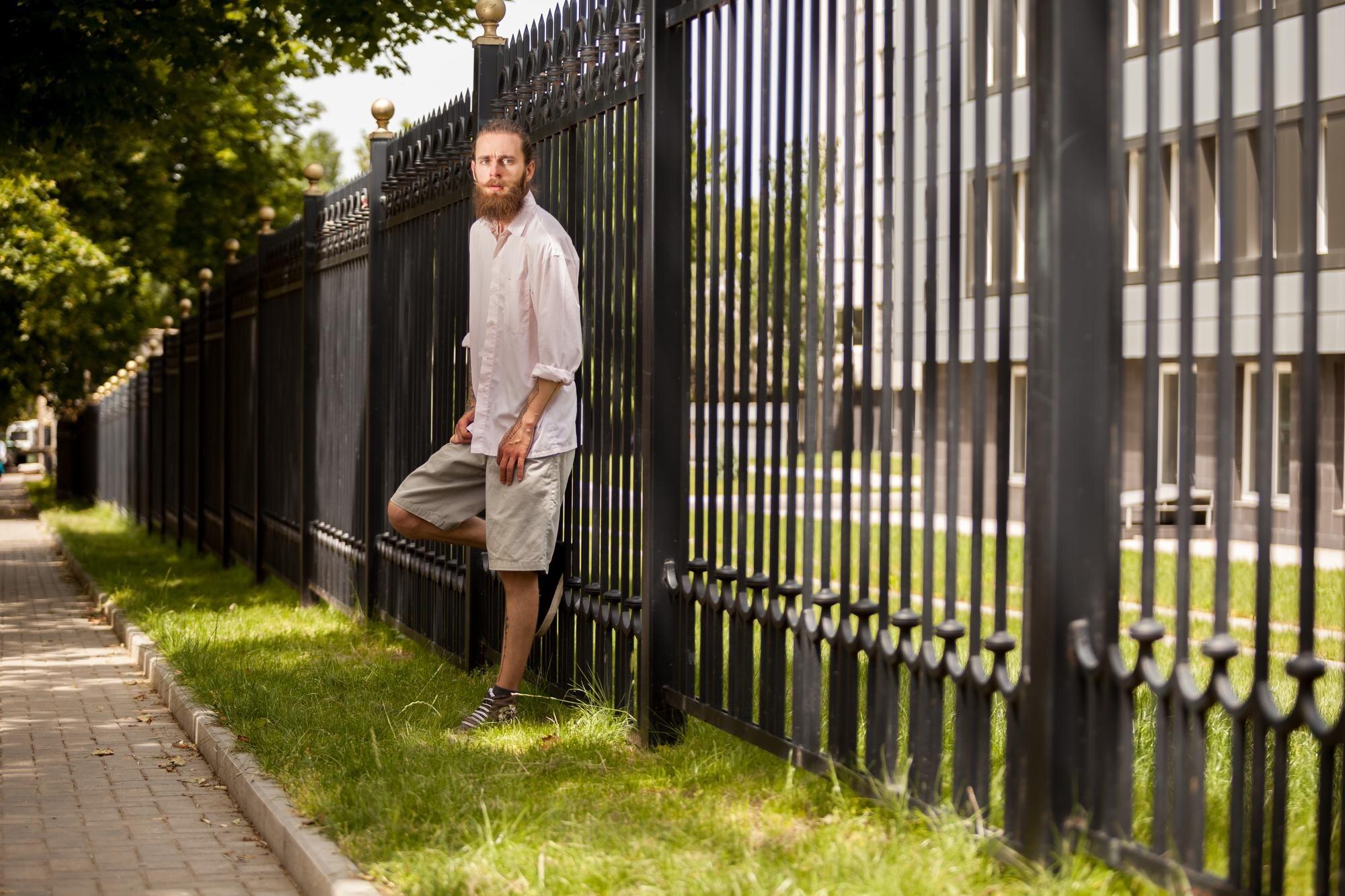 Bearded Hipster Posing Outside In The City Style