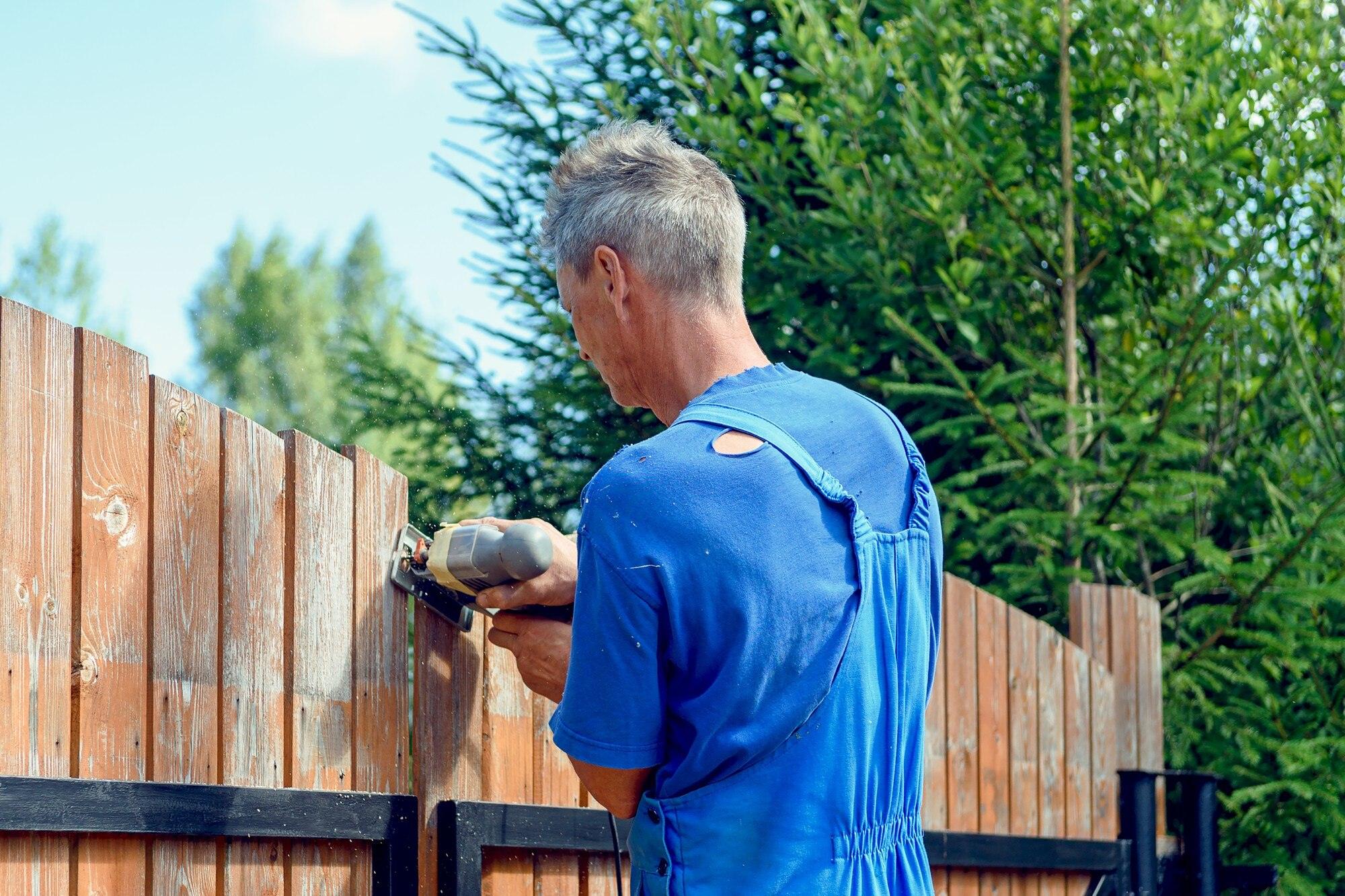 Close Up Of The Process Of Cutting The Fence With