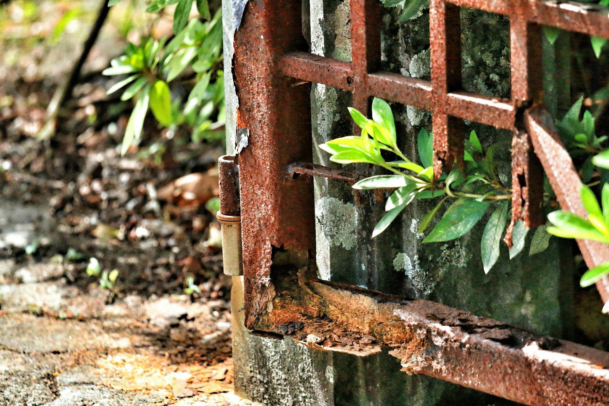 Damaged Rusty Metal Gate