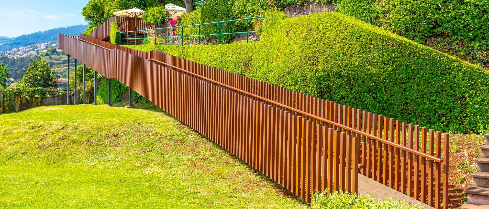 Ramp With A Wooden Fence For People In Wheelchairs