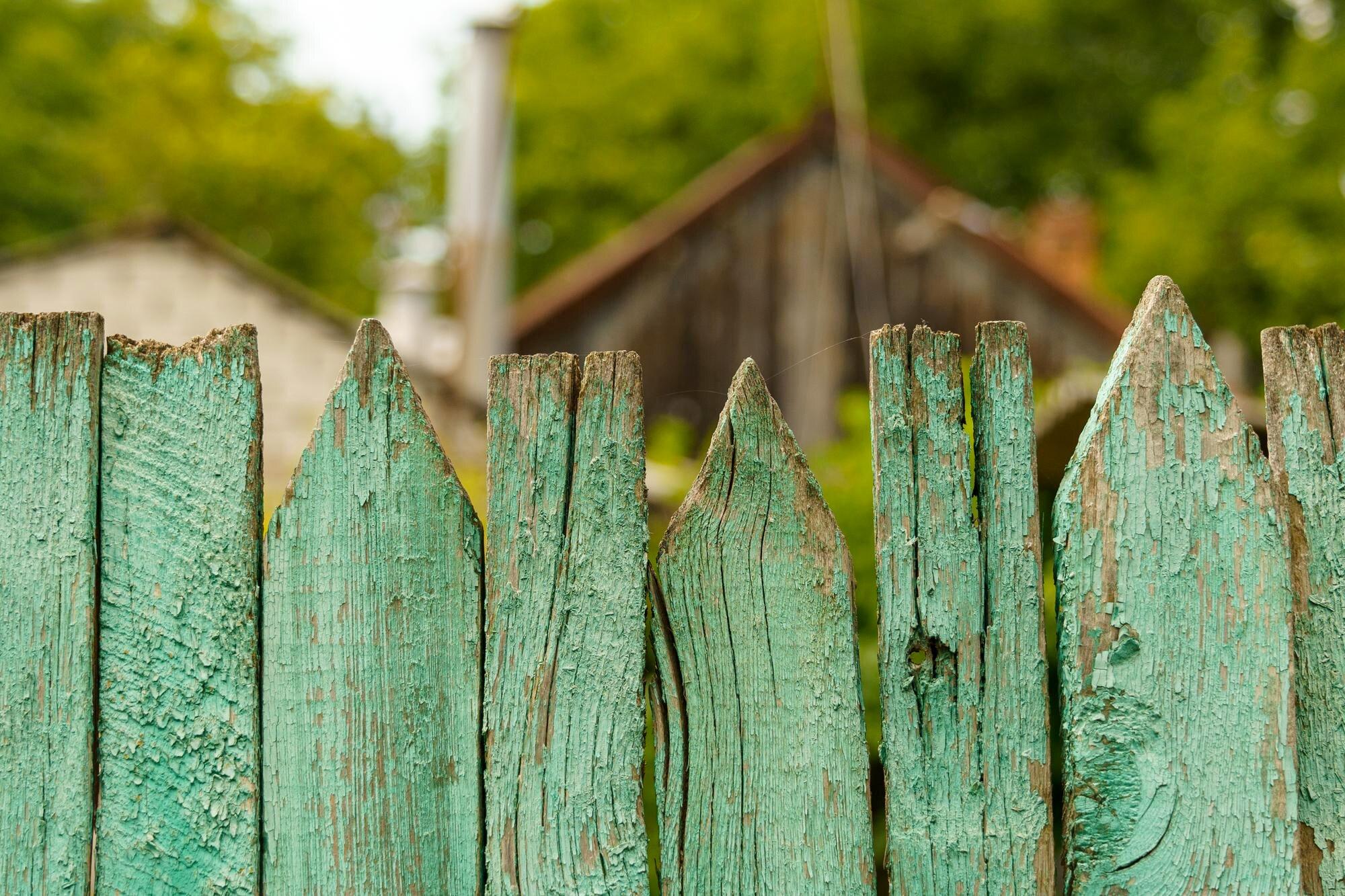 The Top Of An Old Fence Closeup In The Village Hou