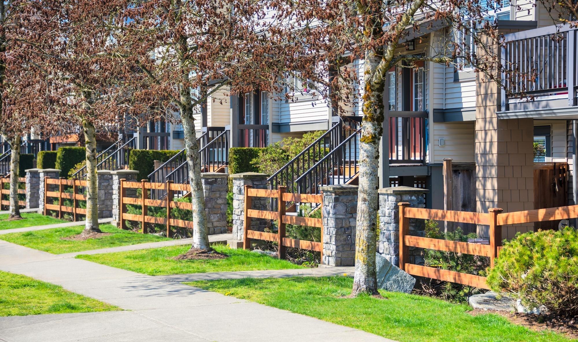 Wooden Front Yard Fence And Entrnace Of Residentia
